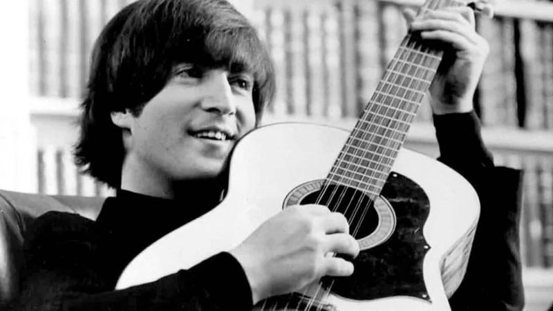 Lennon with guitar