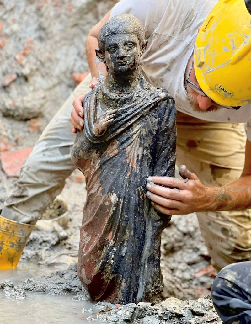 Dozens of unique bronze statues have been found in the ancient baths of Italy.