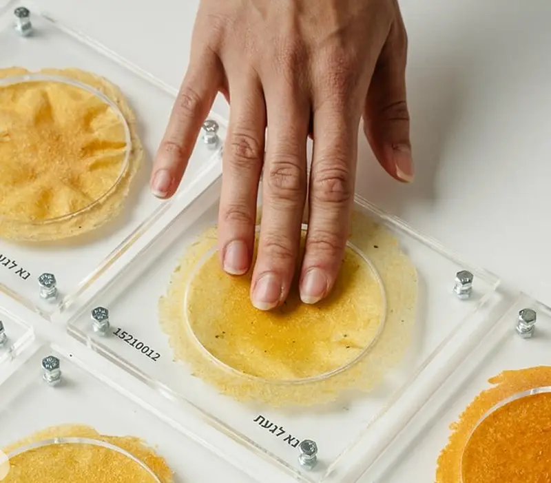 An orange toilet paper substitute has been invented for tourists.