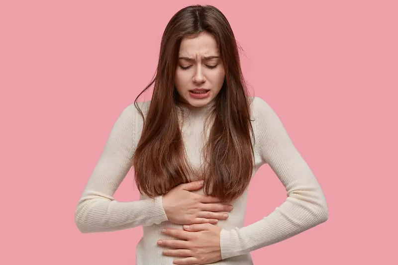 Why does side pain occur during training and how can it be addressed?