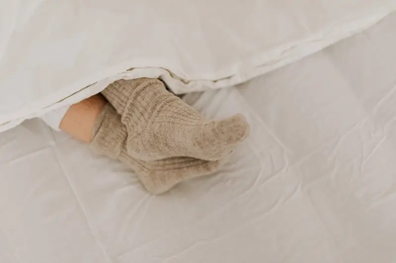 Is the heat keeping you awake? Put on some socks!