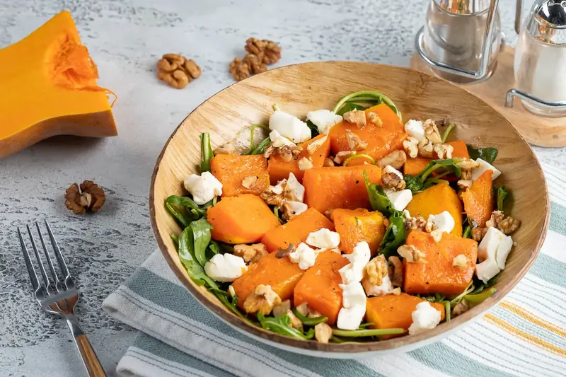 Recipe for health: salad with pumpkin and walnuts.