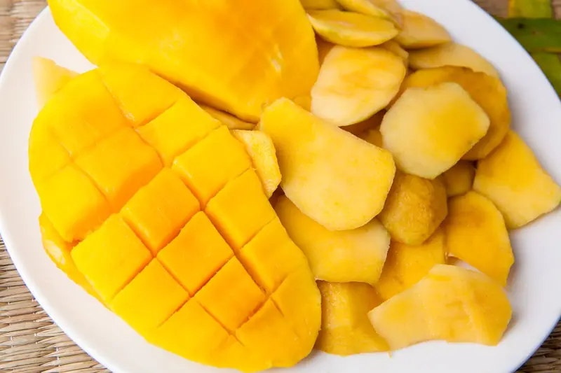 The Mysterious Stranger: The Benefits and Harms of Mangoes