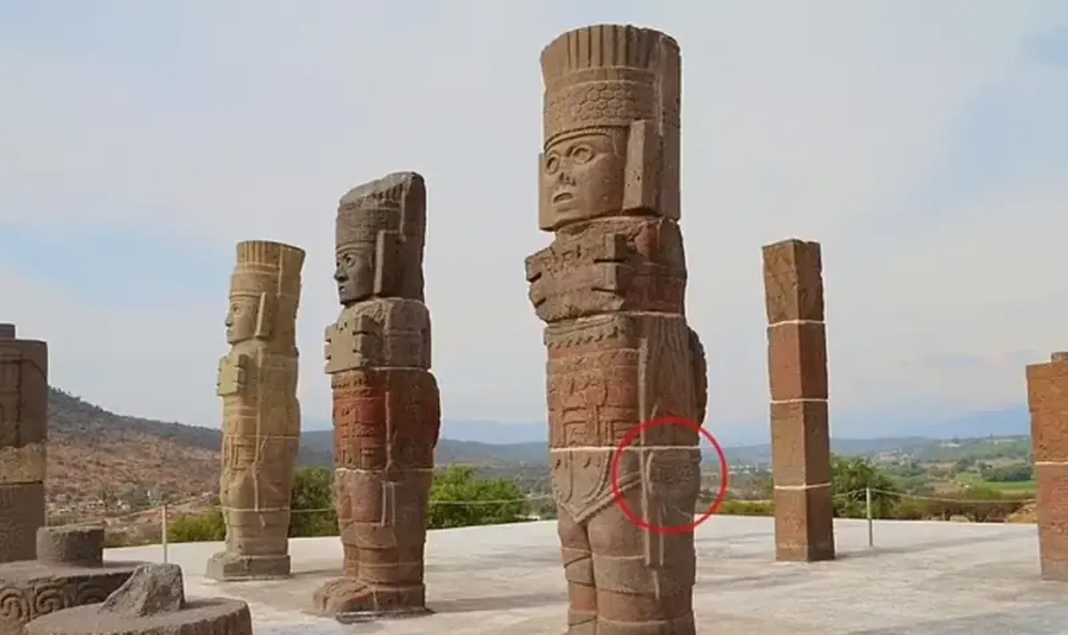 Why are modern women's handbags depicted on ancient monuments?