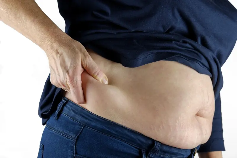 Why does the sneaky waist increase with age?