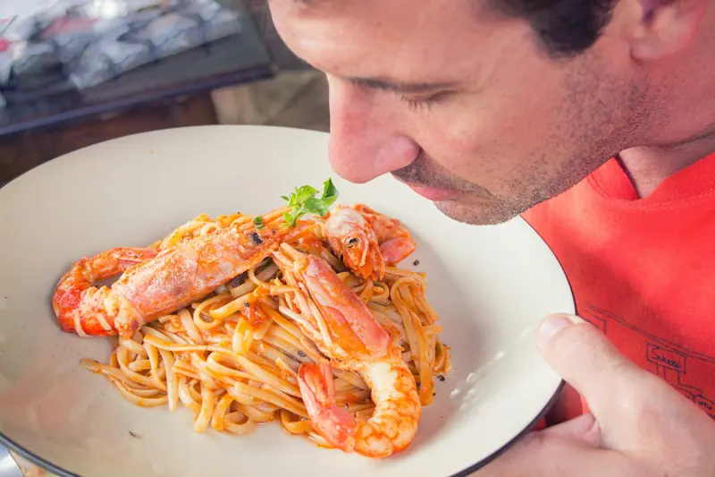 A late dinner isn't harmful if there's a late breakfast the next day.