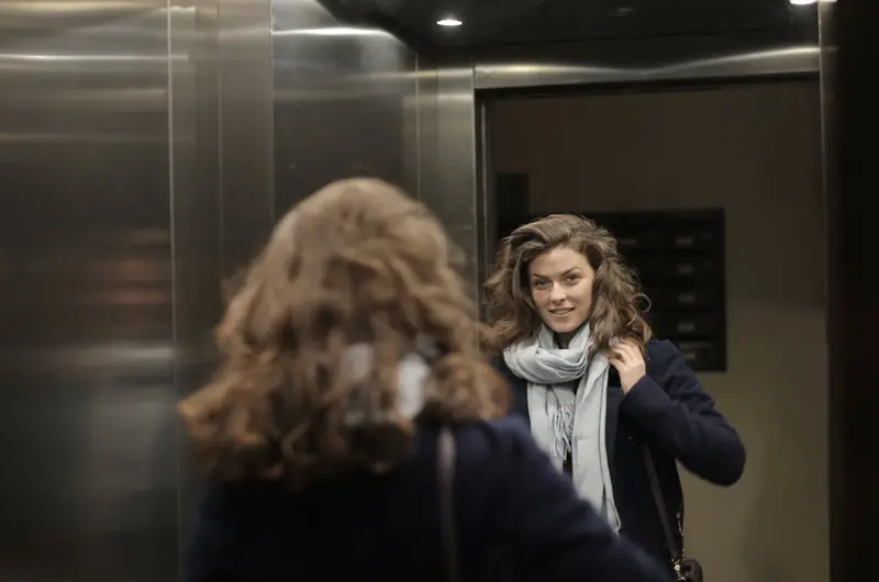 Why are mirrors installed in elevators?