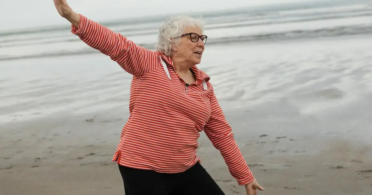 Woman exercising by the sea
