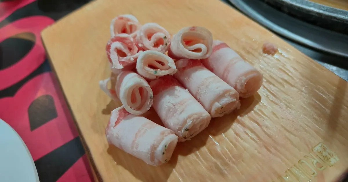 a bunch of food that is on a cutting board