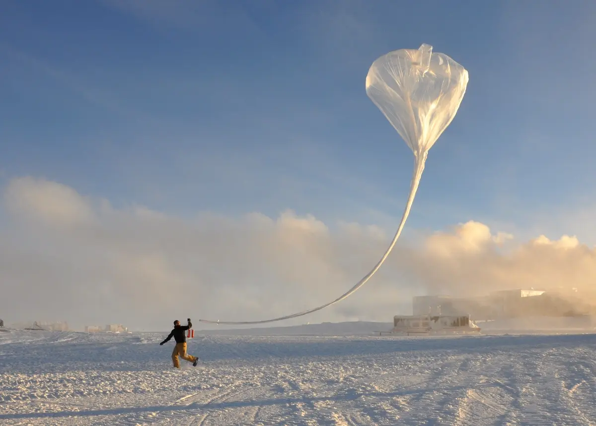 Meteorologists launch a probe to measure ozone in Antarctica
