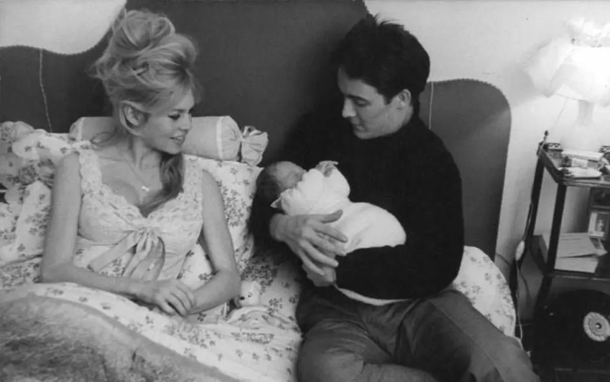 Brigitte with Jacques Charrier and newborn son