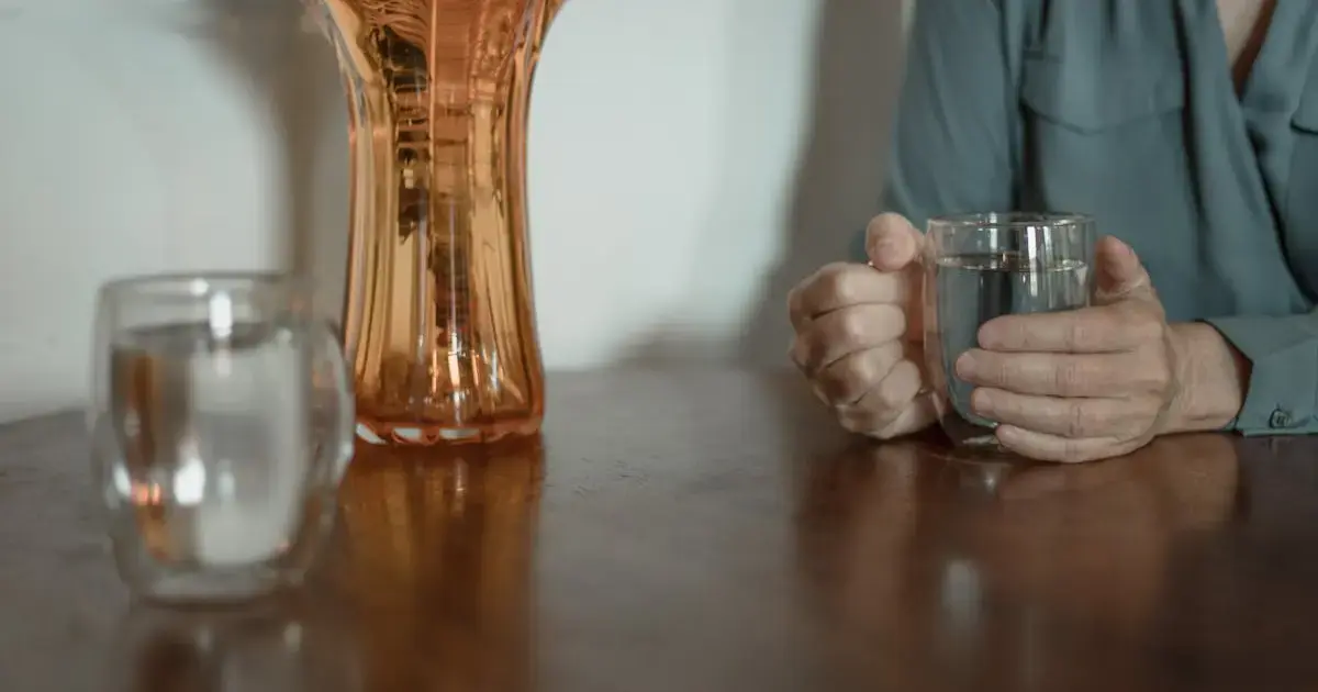 woman with a glass of water