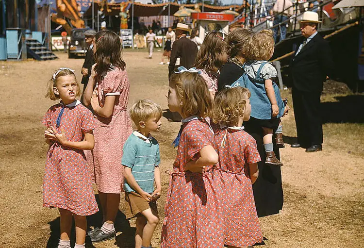 Children in clothing made from burlap