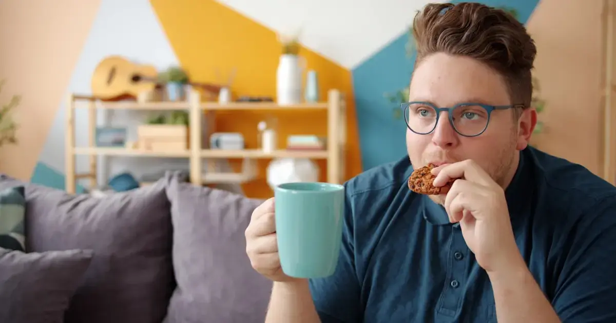 man eating cookies