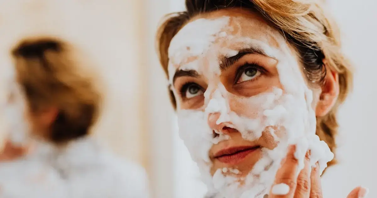 woman with scrub on her face