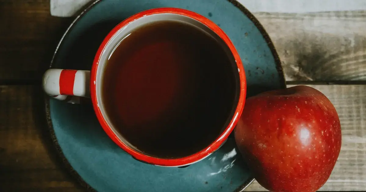 a cup of tea and an apple