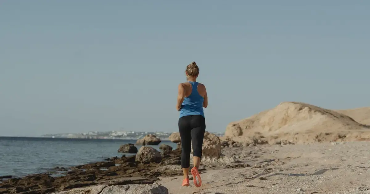 woman running on the beach