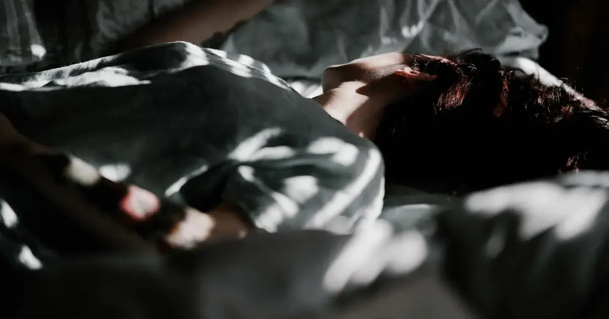 a person sleeping in bed