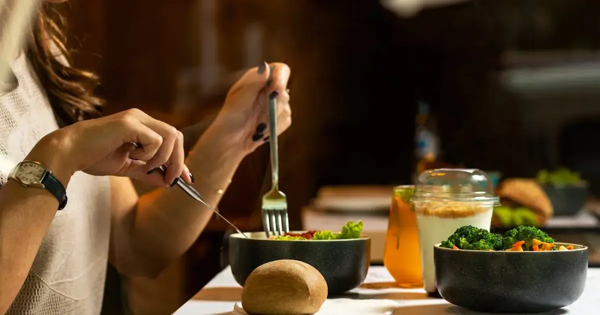 Woman eating fresh salad