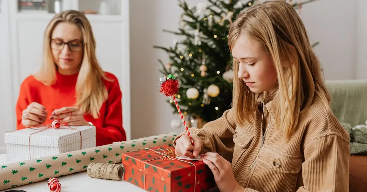 Women wrapping Christmas gifts