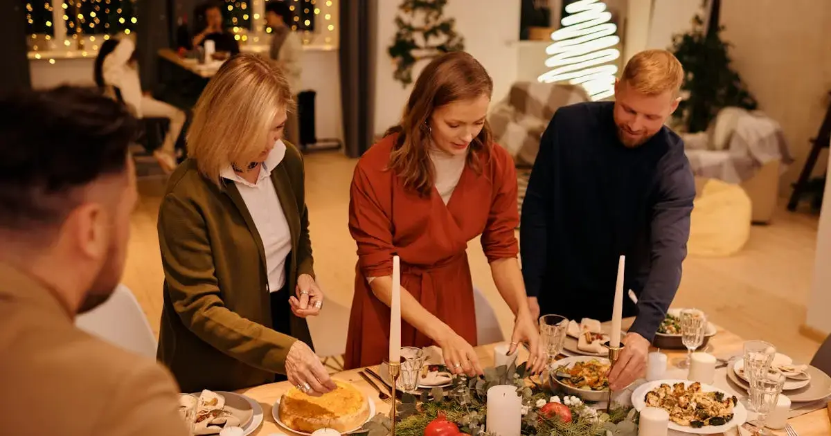 Family setting the Christmas table