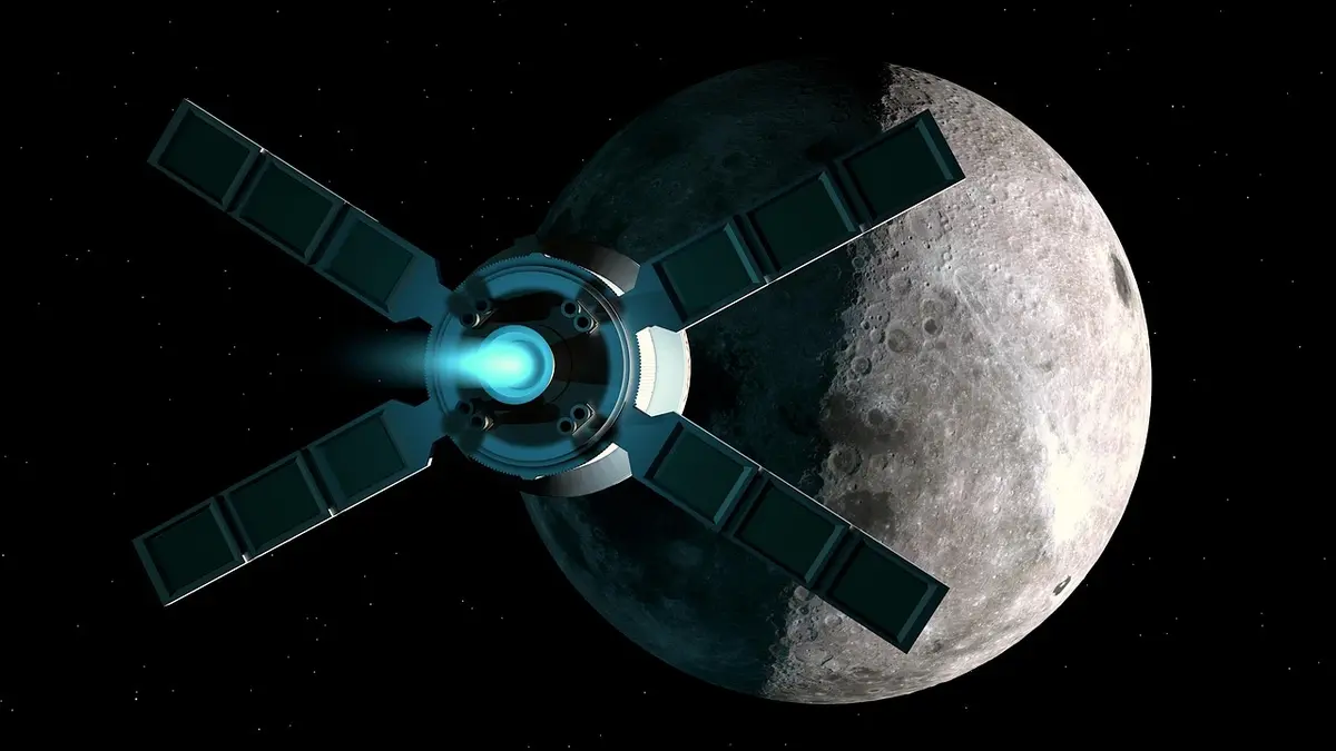 Spacecraft against the backdrop of the Moon