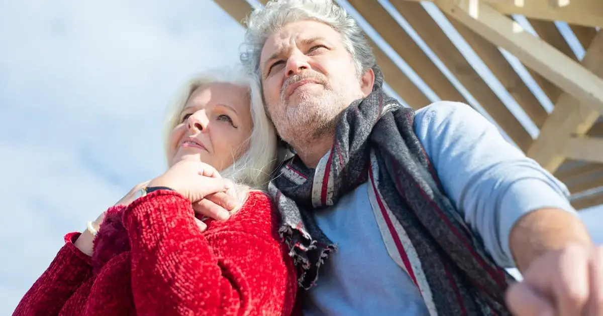 older man and woman in winter sun