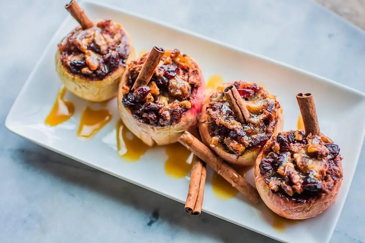 Baked apples with jam and nuts