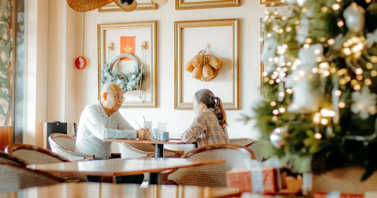 man and woman at a cafe table