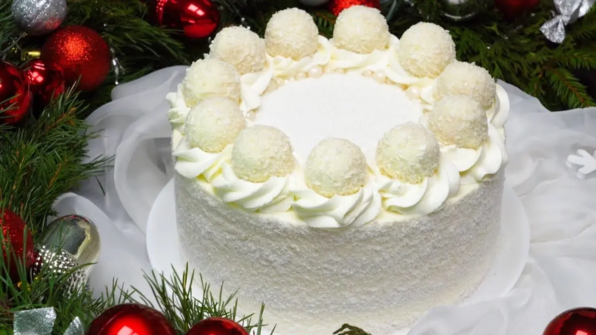 Festive dessert 'Snowy' Raffaello cake with condensed milk