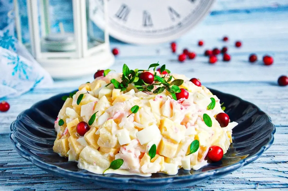 For celebrations and everyday meals: salad with pineapple, cheese, and crab sticks