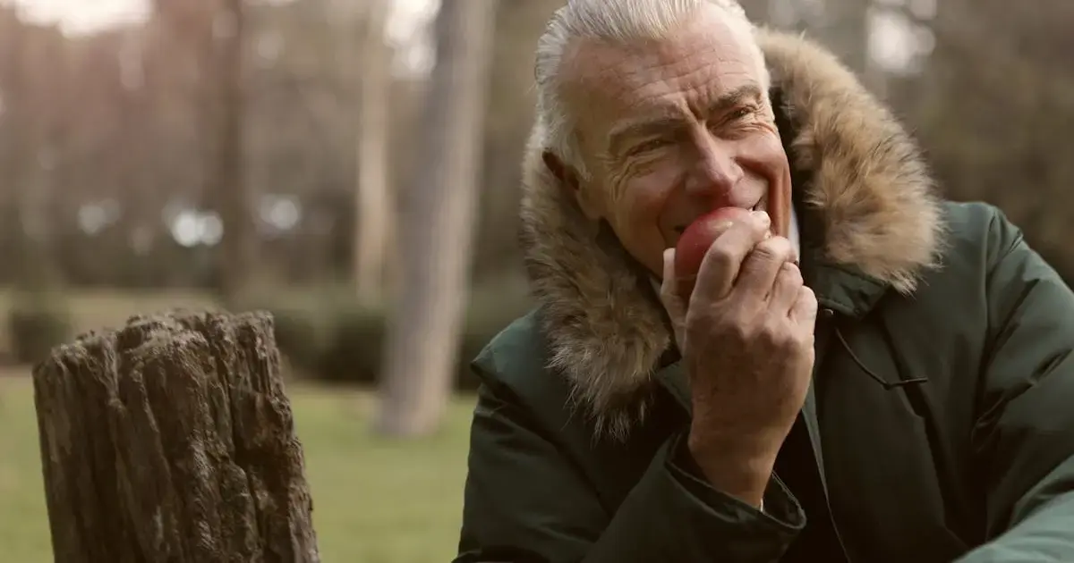 man eating an apple