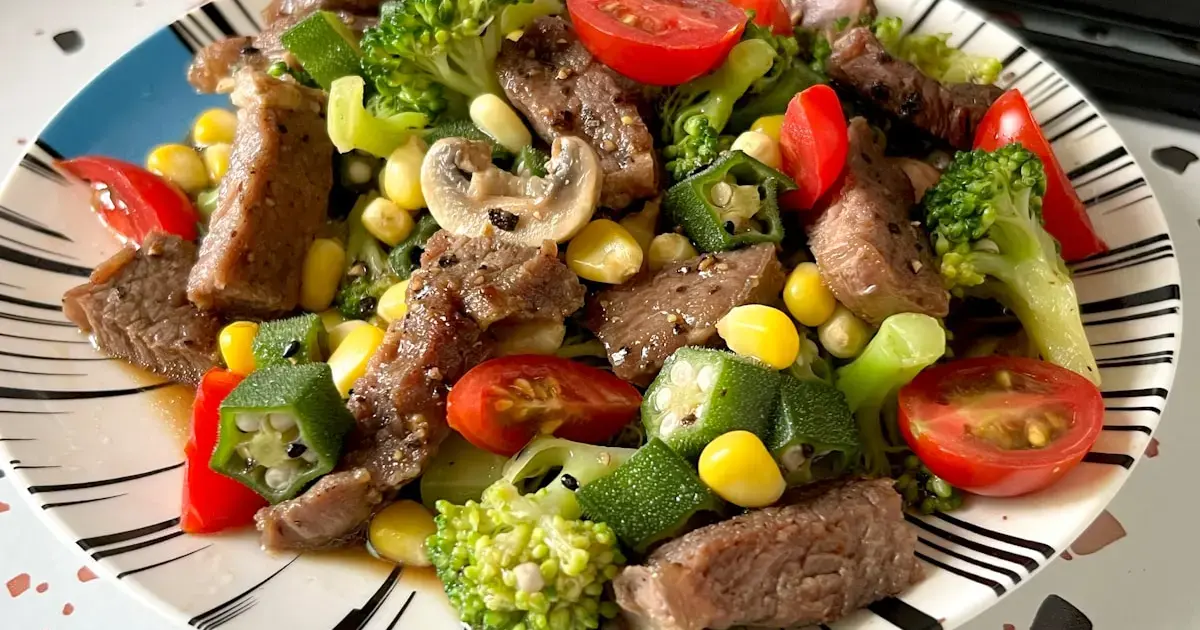 a plate with vegetables and meat