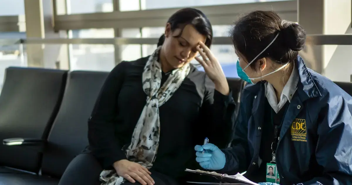 a woman consulting a doctor at the airport