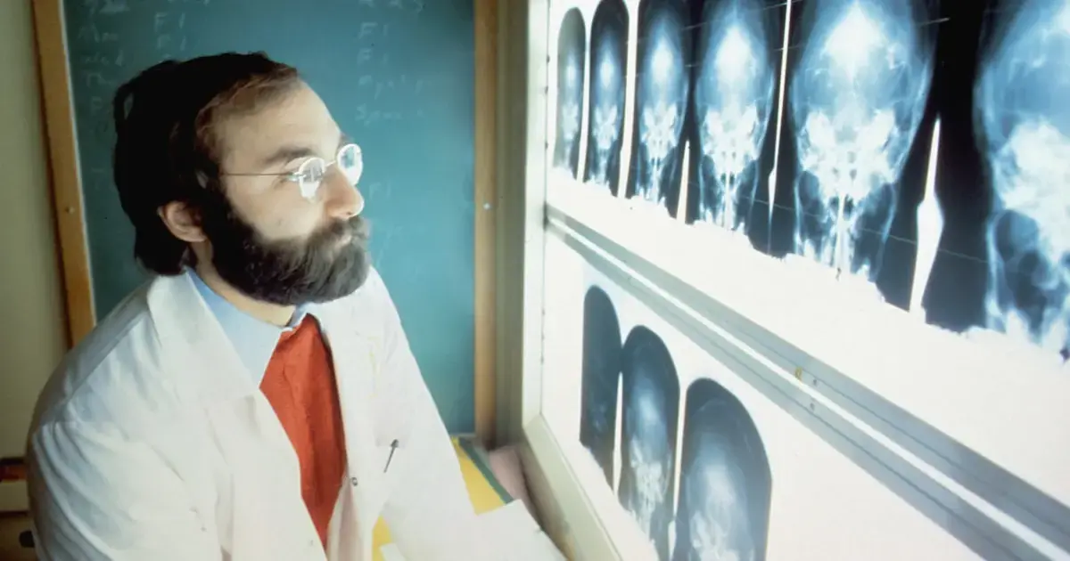 Doctor examining brain scans