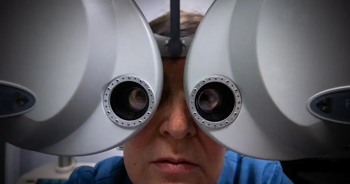 A man undergoing vision diagnostics