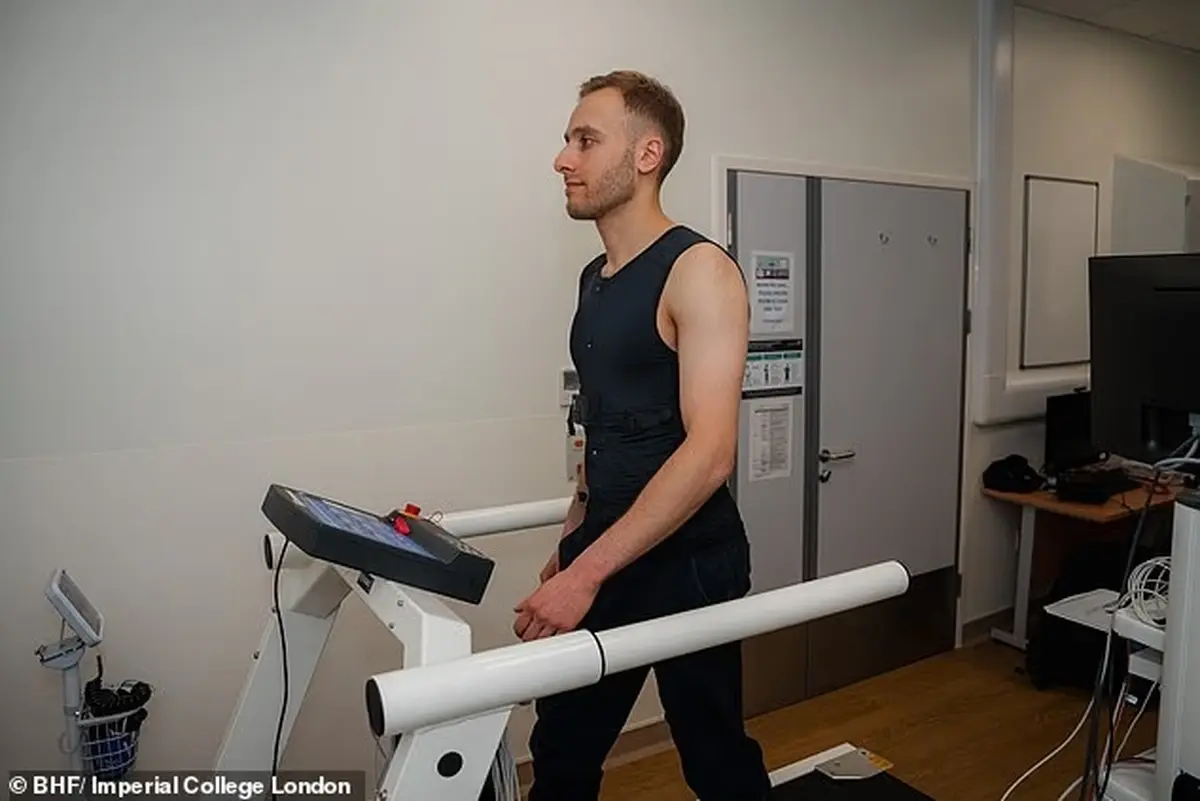 Man on a treadmill in a smart shirt