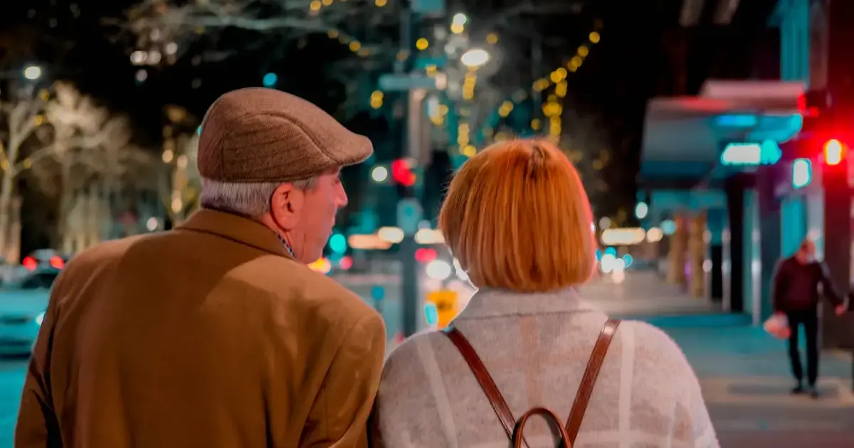 A man and woman walking in the city