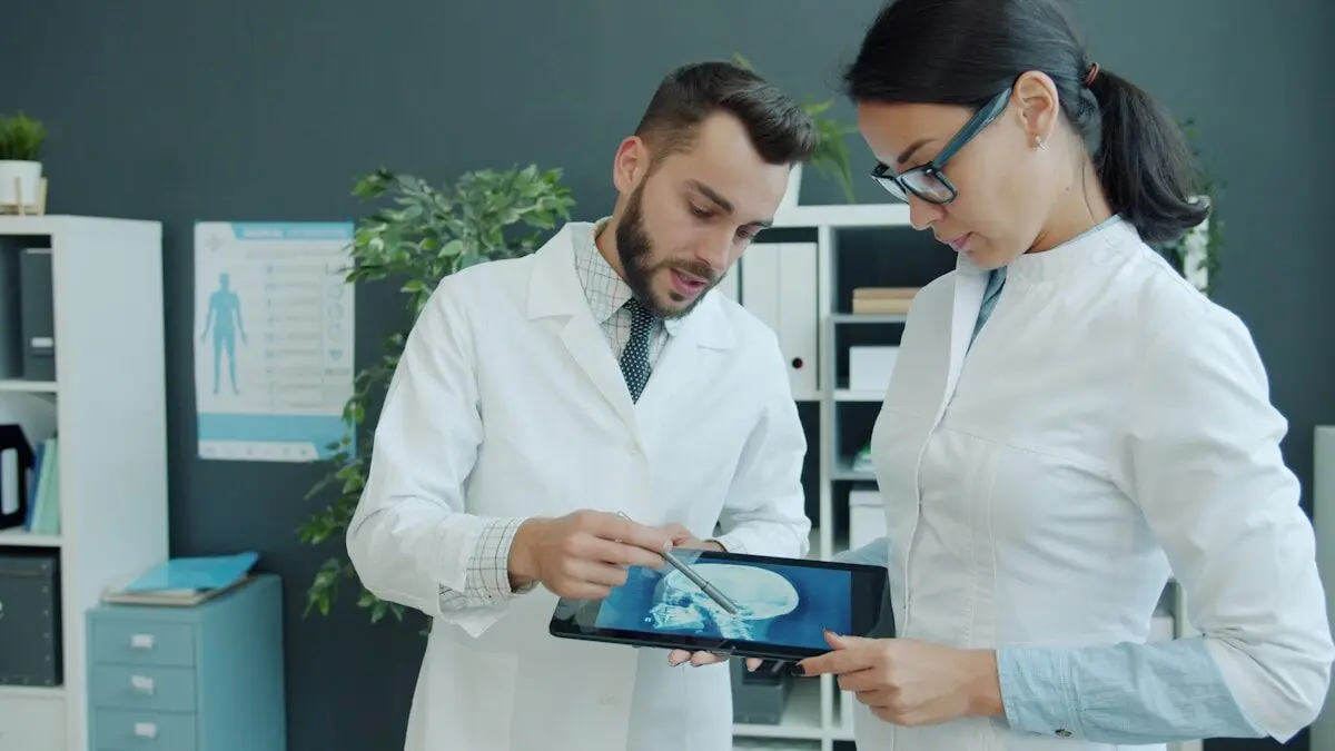 doctors examine a brain MRI